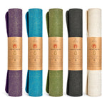 CompleteGrip™ Jute Non-Slip Yoga Mat photograph of rolled yoga mats in Forest Green, Space Black, and Eco Natural White #yoga-mat-bag-colour_mindful-jungle